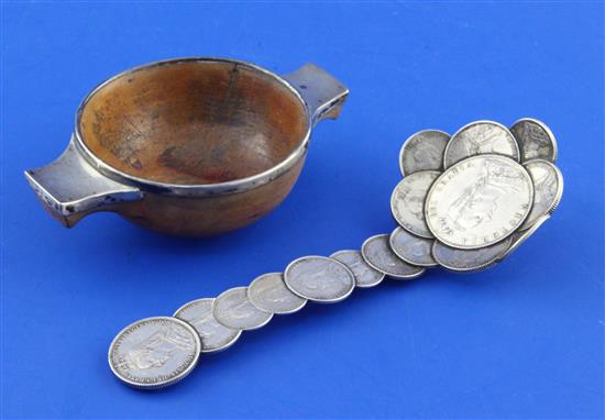 An early 19th century Scottish silver mounted blonde wood quaich and a spoon constructed with coins, 5.5in.